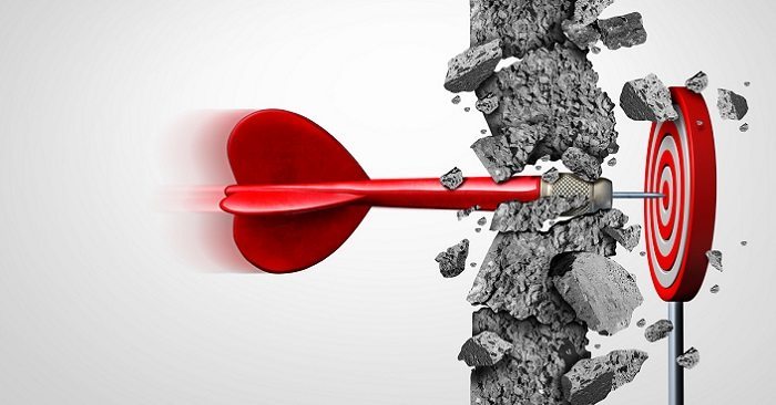 arrow breaking through barrier and hitting target