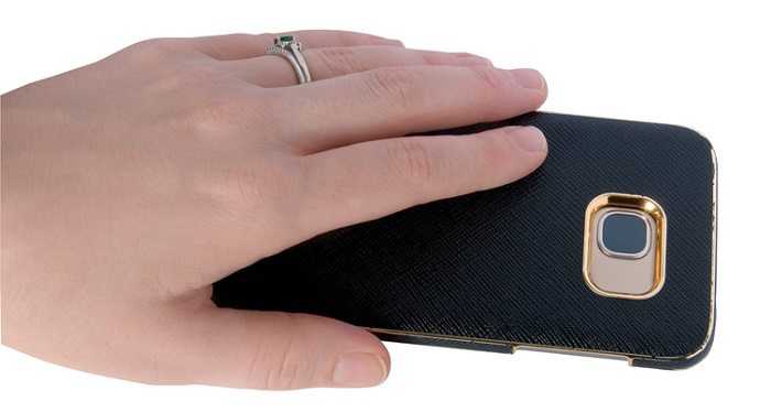 female hand putting smartphone face down