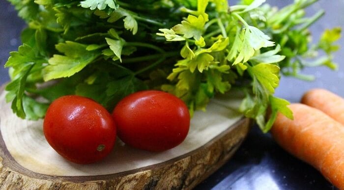 serving of greens and tomatoes