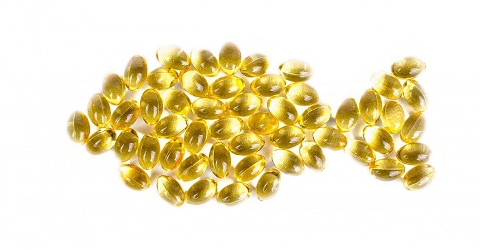 omega 3 essential oil supplements in shape of fish