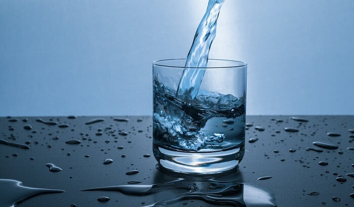 water being poured into glass