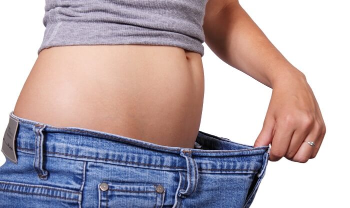 weight loss - woman wearing loose pants