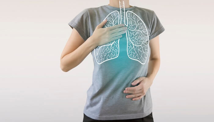woman practicing diaphragmatic breathing