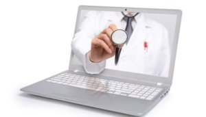 what is telemedicine concept - laptop with virtual doctor on screen
