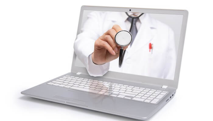 what is telemedicine concept - laptop with virtual doctor on screen