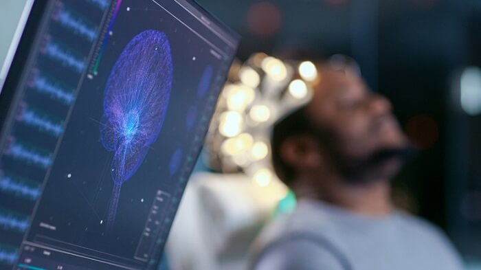 man hooked up to eeg device