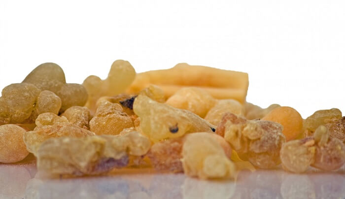 dried frankincense resin on white background