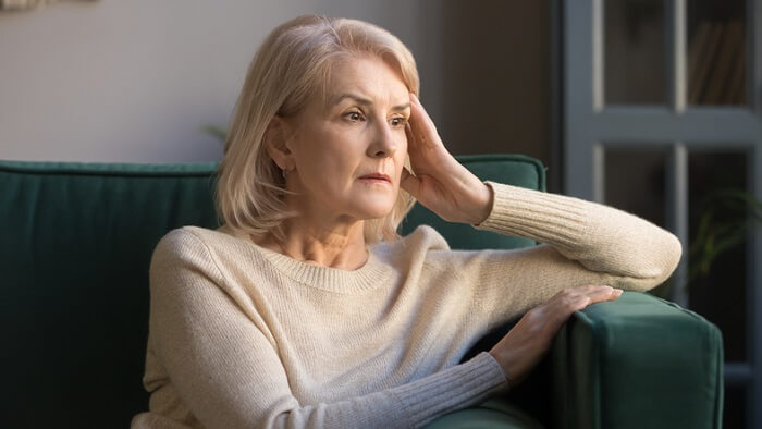 senior woman looking depressed