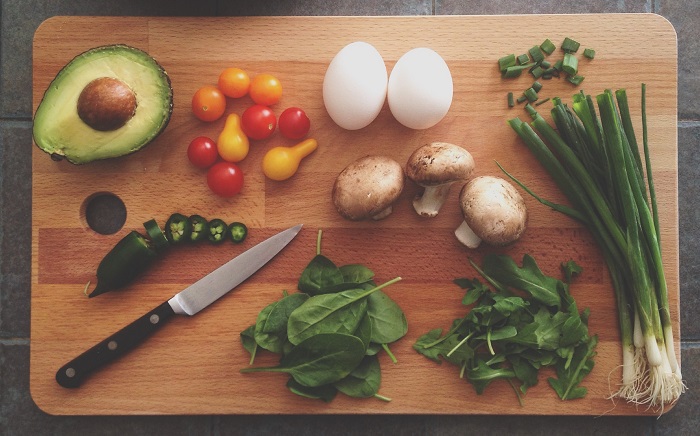 eggs and veggies on cutting board