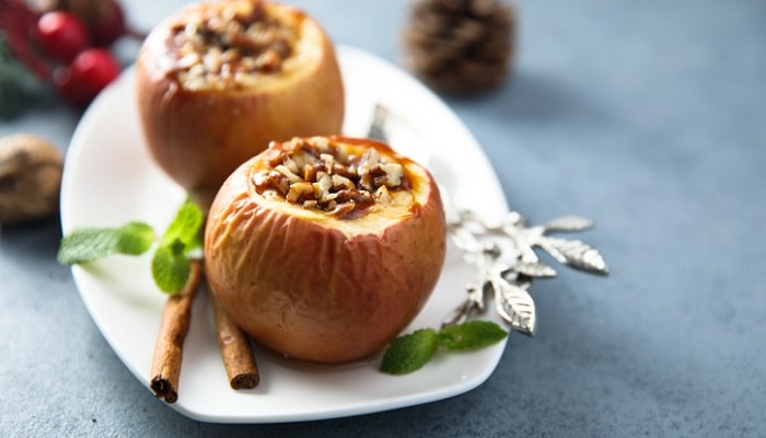 baked apples with cinnamon on plate