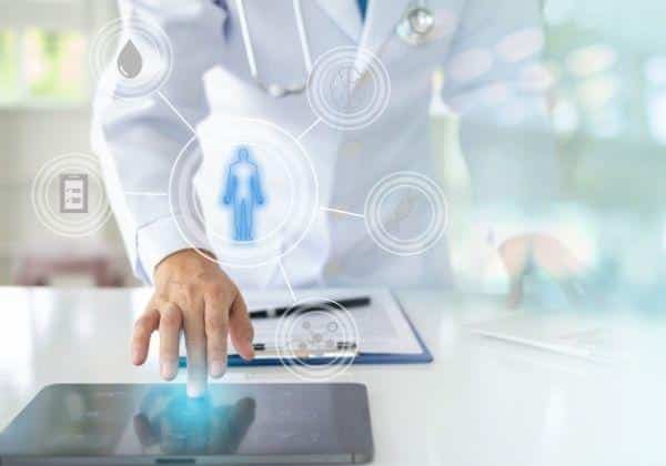 doctor using ipad screen - technology concept