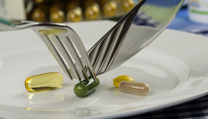 supplements on dinner plate
