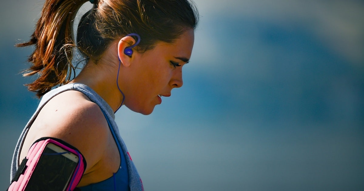 Woman catching her breathe after jog