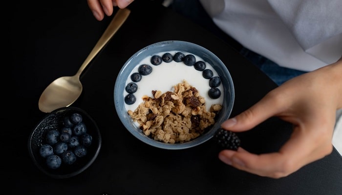 bowl of granola with blueberries