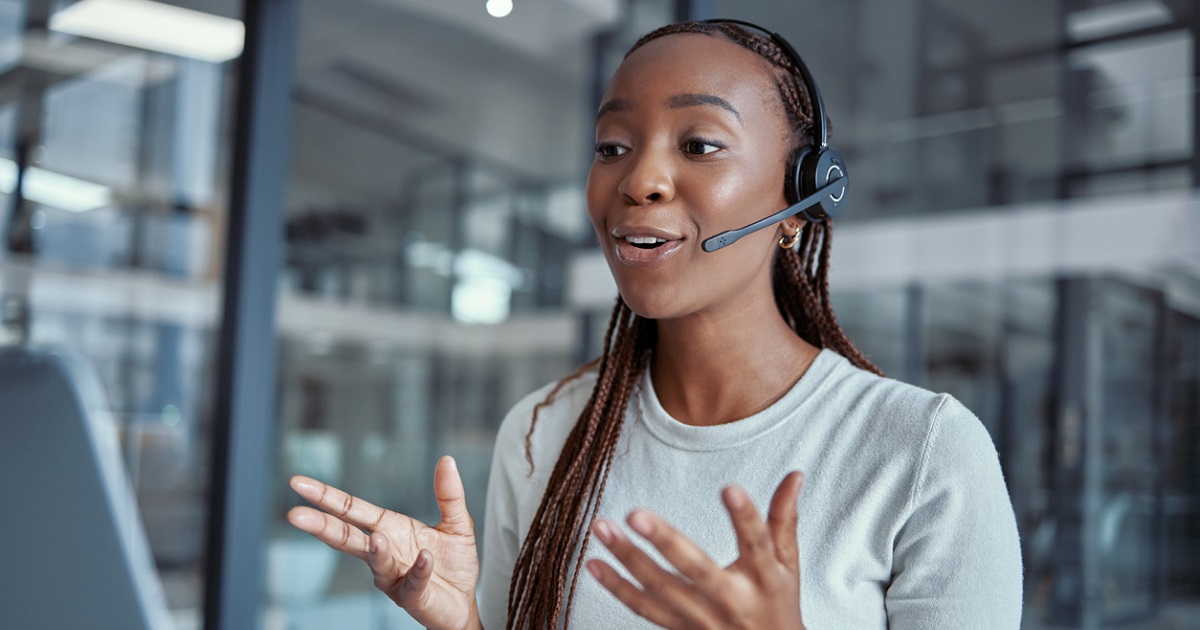 young woman speaking into headset