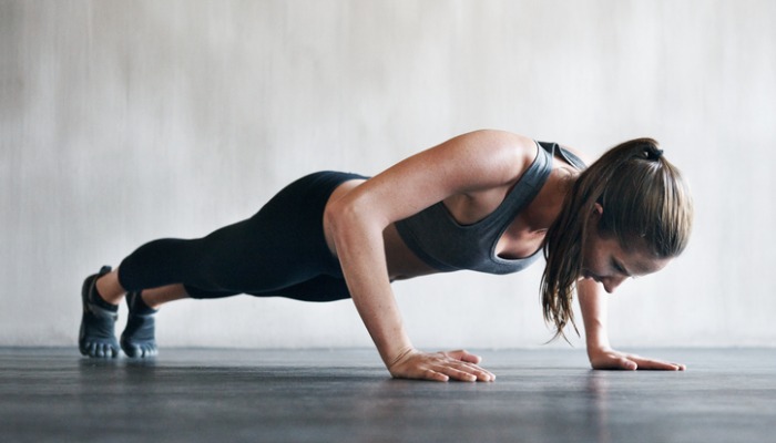 woman in push-up position