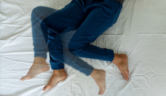 turning in bed - restless leg syndrome concept