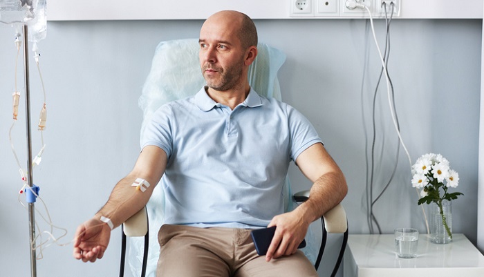 man getting iv treatment for migraine